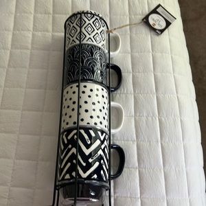 Navy blue and white stacking coffee cups in stand